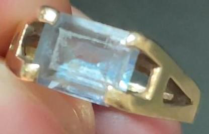 Blue stone ring in a close-up workshop detail
