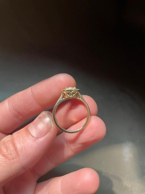 Finished resized ring in profile with the stone setting visible